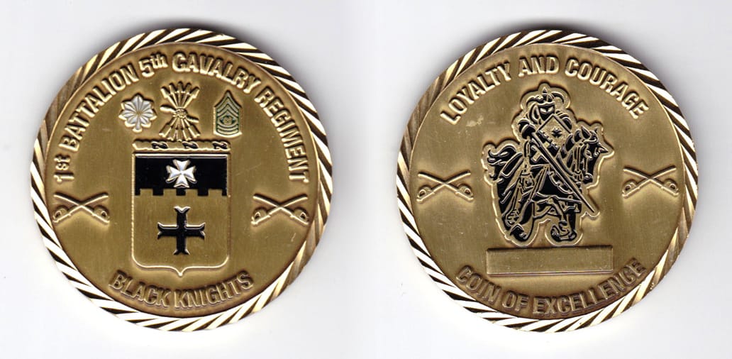 Round shaped, brass colored coin, 2 inches in diameter.