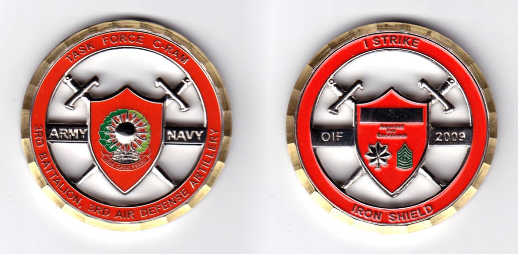 Round shaped, brass colored coin, 2 inches in diameter.