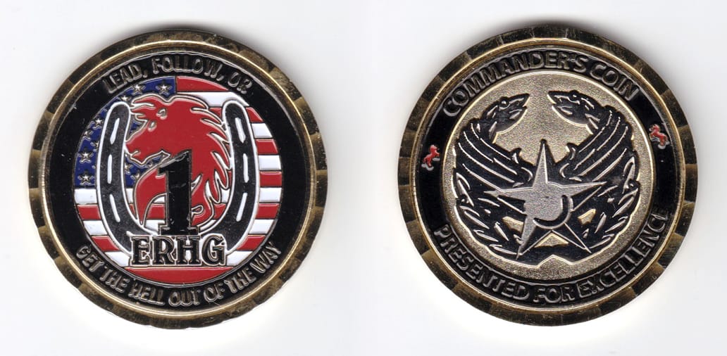 Round shaped, brass colored coin, 2 inches in diameter.