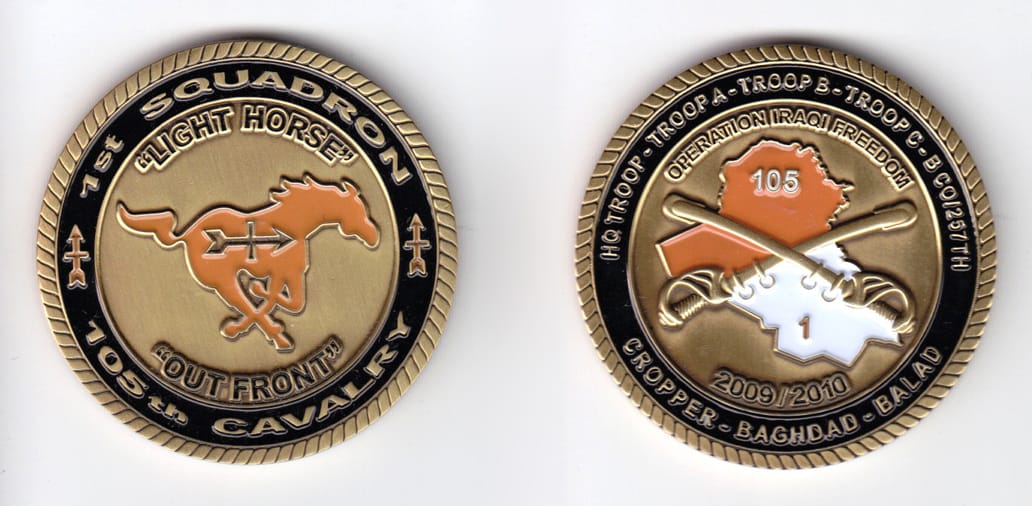 Round shaped, antique brass colored coin, 2 inches in diameter.