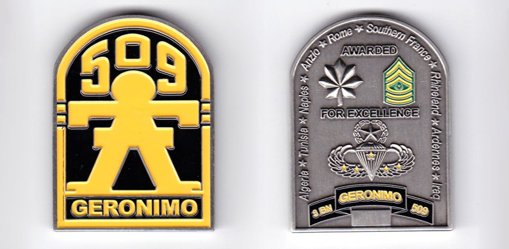 Retangular shaped, with rounded top, pewter colored coin, 1-1/2 inches wide x  2 inches high.