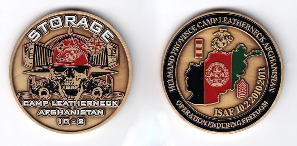 Round shaped, antique brass colored coin, 2 inches in diameter.