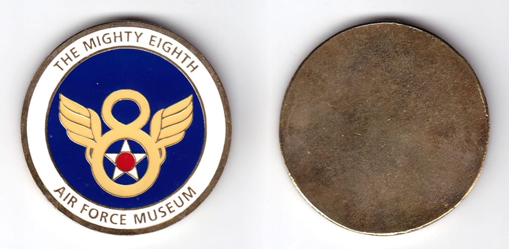 Round shaped, brass colored coin, 2 inches in diameter.