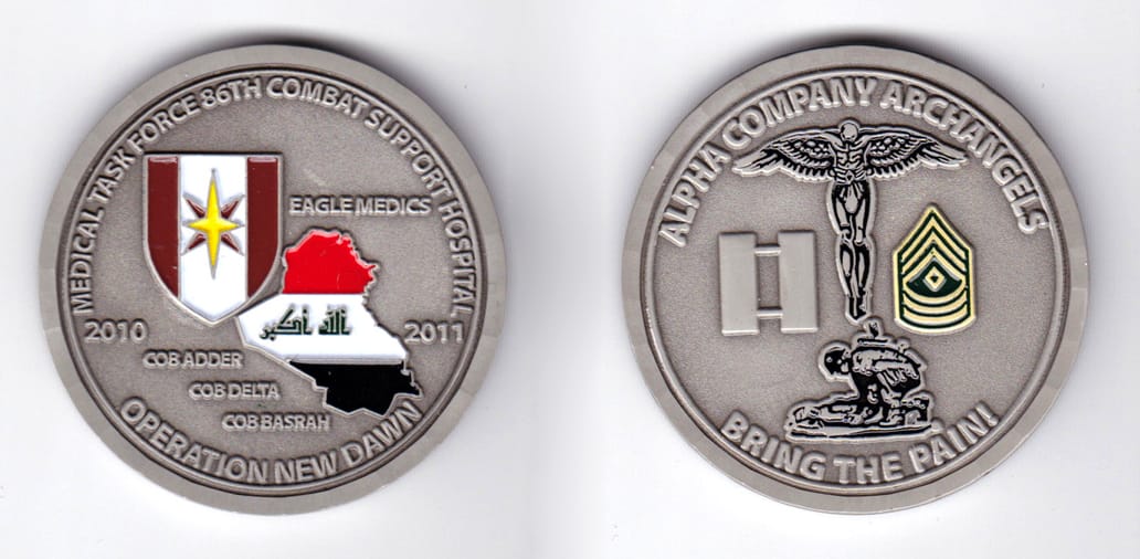 Round shaped, gray colored coin, 2 inches in diameter.