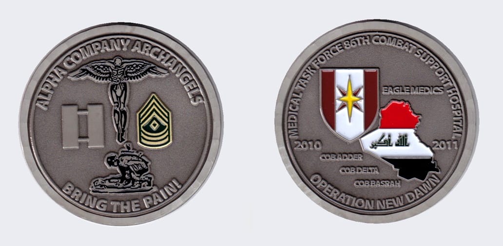 Round shaped, gray colored coin, 2 inches in diameter.