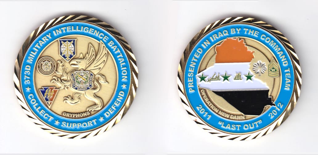 Round shaped, gold colored coin, 2 inches in diameter.