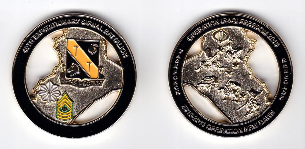 Round shaped, gold colored coin, 2 inches in diameter.