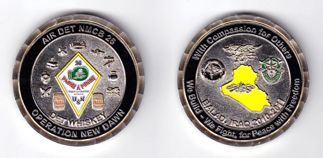 Round shaped, silver colored coin, 2 inches in diameter.