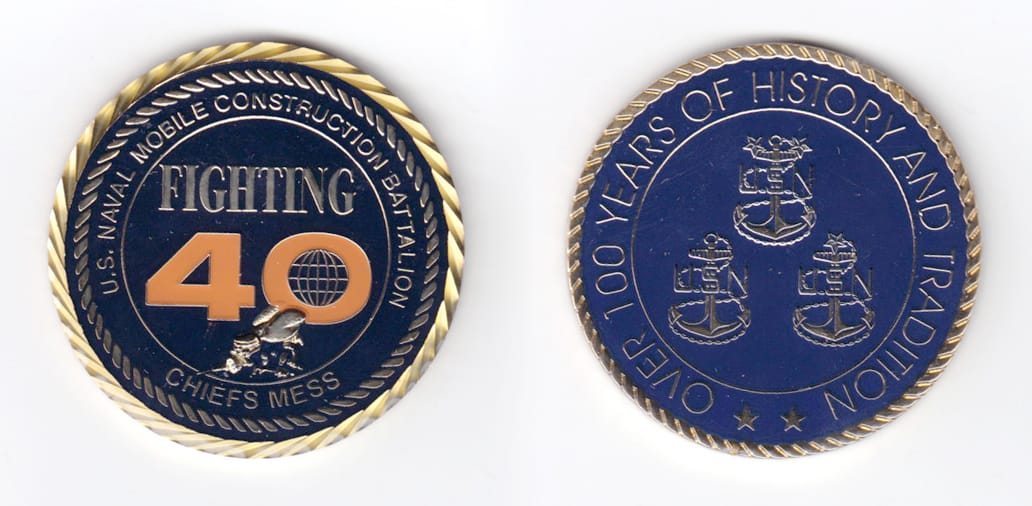 Round shaped, gold colored coin, 2 inches in diameter.