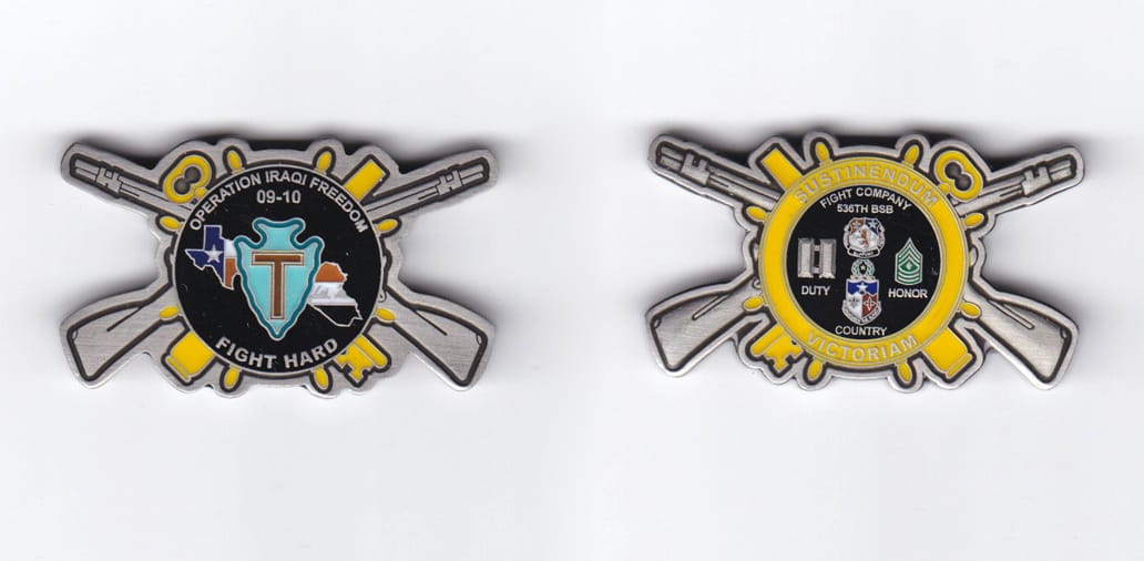 Round with crossed key, cannon, ship wheel spokes and rifles extended shaped, pewter colored coin, 2 inches wide x  1-3/...