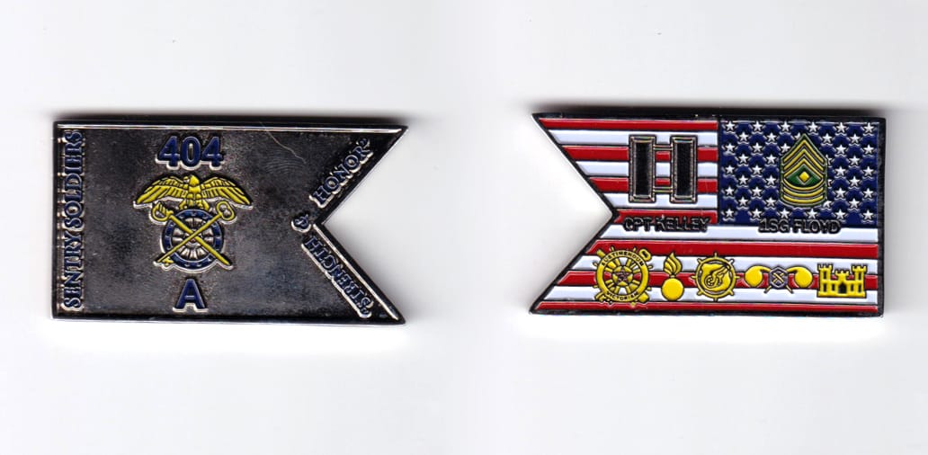 Guidon shaped, silver colored coin, 2 inches wide x  1-1/8 inches high.