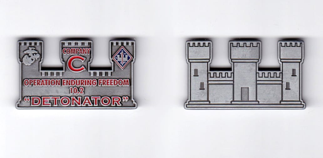 Engineer castle shaped, pewter colored coin, 2 inches wide x  1-1/8 inches high.
