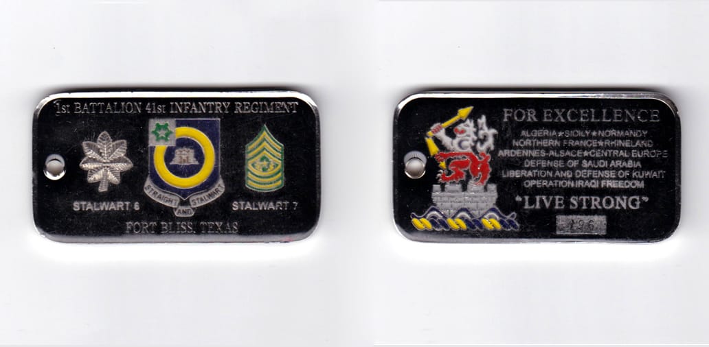 Retangular shaped, silver colored coin, 2-1/2 inches wide x  1-5/16 inches high.