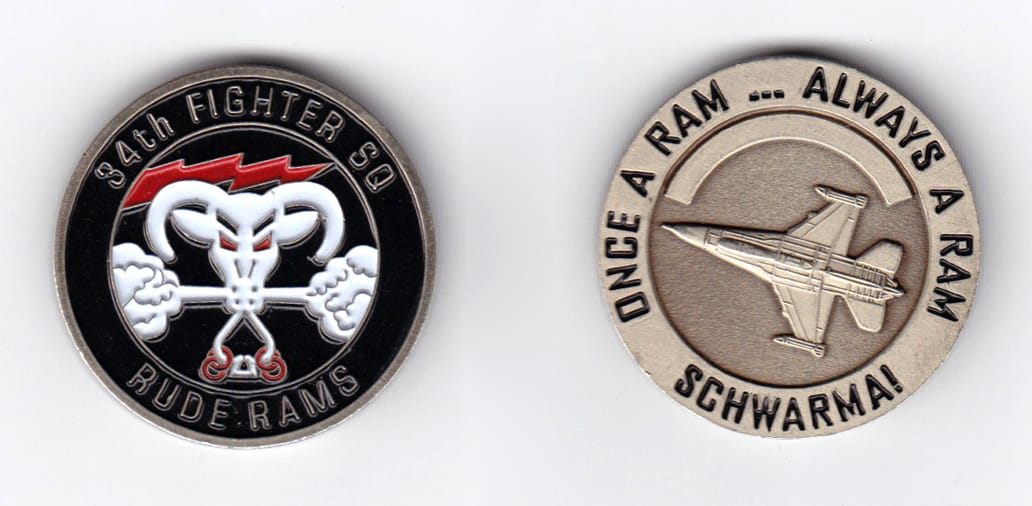 Round shaped, light brass colored coin, 1-1/2 inches in diameter.