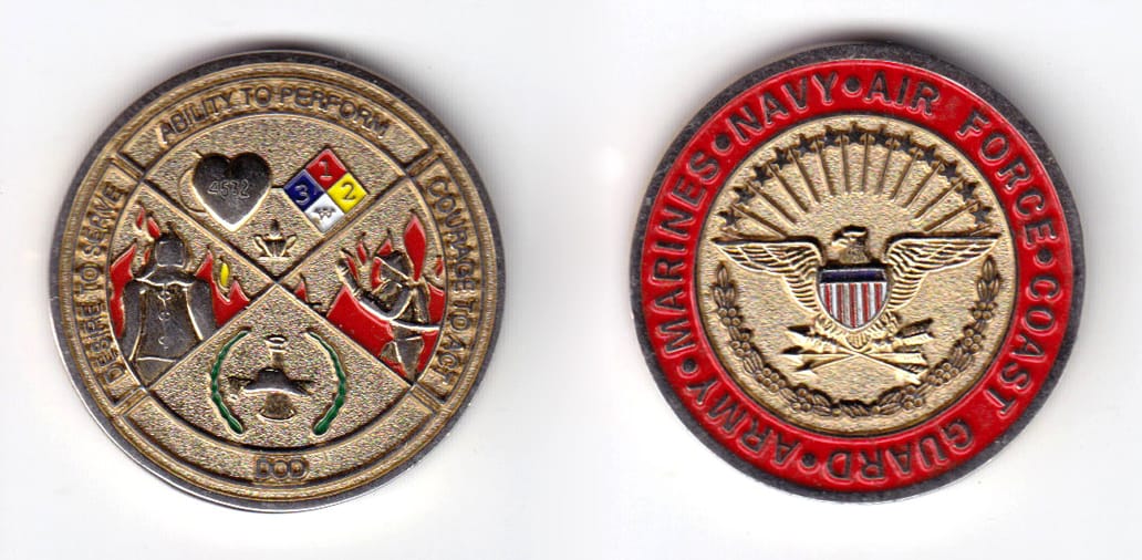 Round shaped, gold colored coin, 1-1/2 inches in diameter.