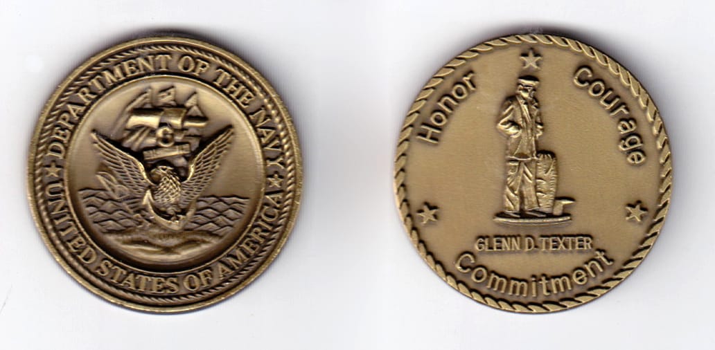 Round shaped, brass colored coin, 1-1/2 inches in diameter.