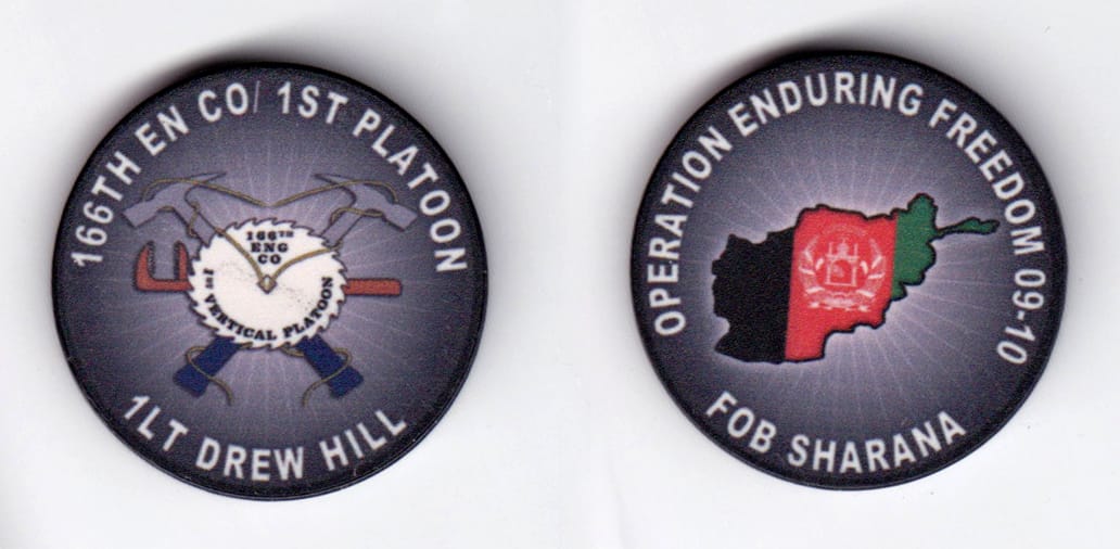 Round shaped, black colored poker chip, 1-1/2 inches in diameter.