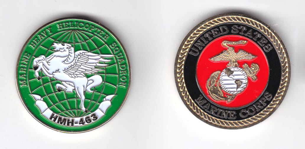 Round shaped, gold colored coin, 1-1/2 inches in diameter.