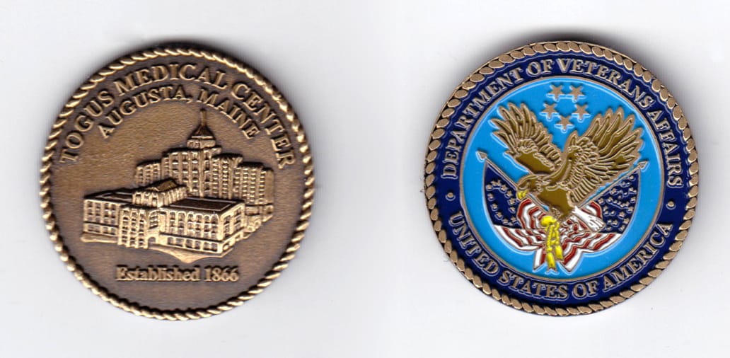 Round shaped, antique brass colored coin, 1-1/2 inches in diameter.