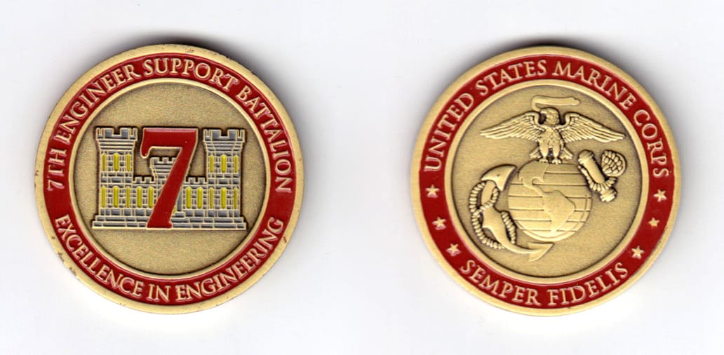 Round shaped, brass colored coin, 1-1/2 inches in diameter.