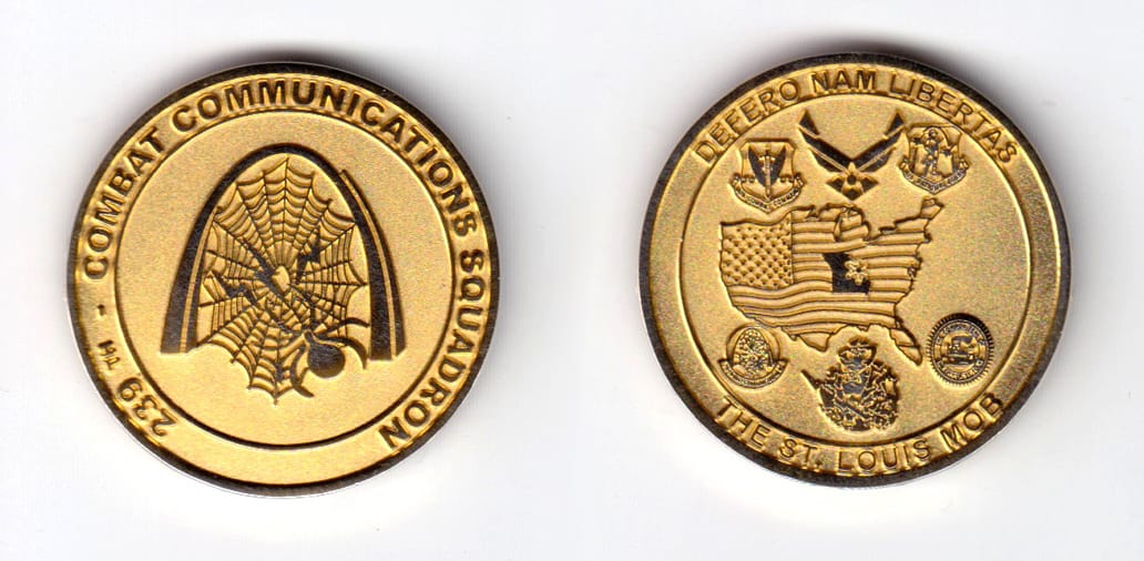 Round shaped, gold colored coin, 1-1/2 inches in diameter.