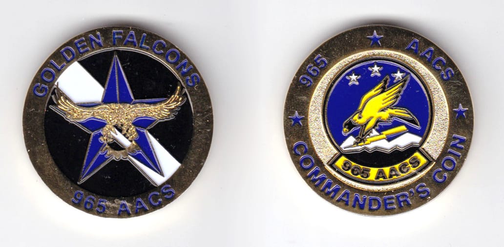 Round shaped, gold colored coin, 1-1/2 inches in diameter.