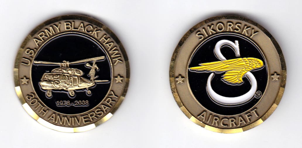 Round shaped, antique brass colored coin, 1-5/8 inches in diameter.