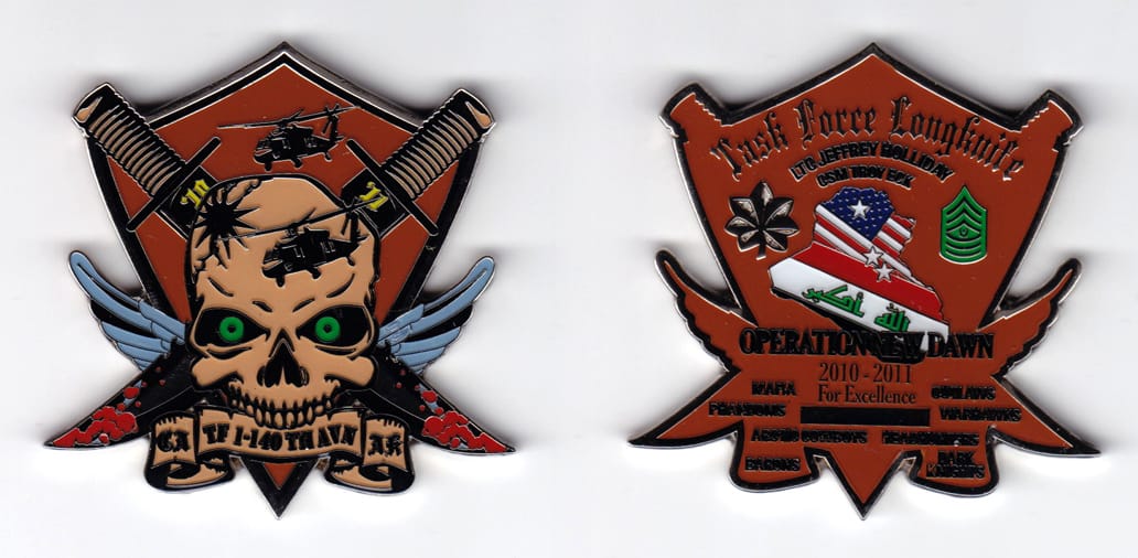 Shield shaped, with crossed daggers, wings and banner mounted beneath extending, silver colored coin, 2-1/2 inches wide ...