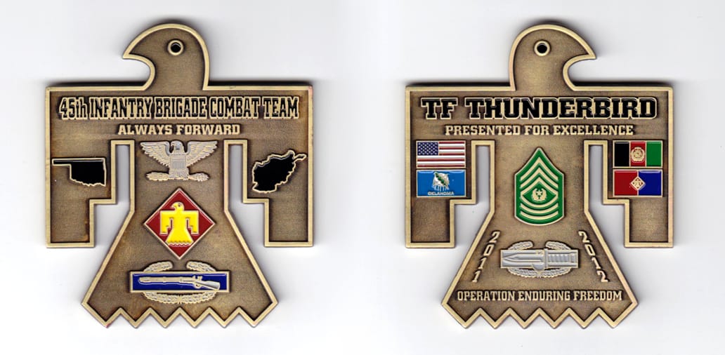 Thunderbird shaped, bronze colored coin, 2-5/8 inches wide x 2-5/8 inches high.