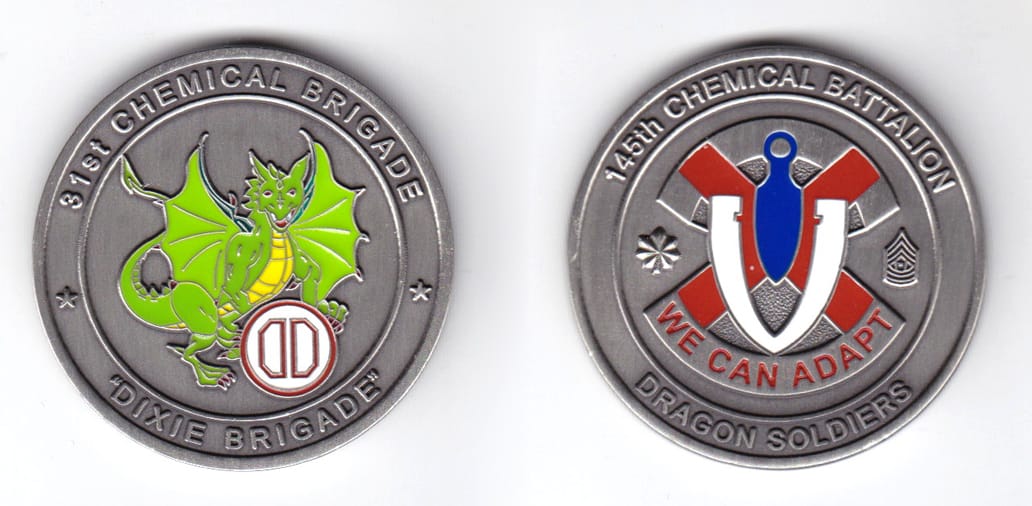 Round shaped, pewter colored coin, 1-3/4 inches in diameter.