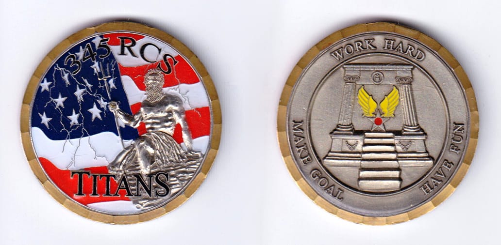 Round shaped, gold colored coin, 1-3/4 inches in diameter.