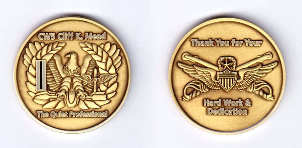 Round shaped, brass colored coin, 1-3/4 inches in diameter.