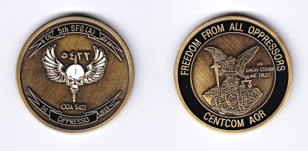 Round shaped, antique brass colored coin, 1-3/4 inches in diameter.