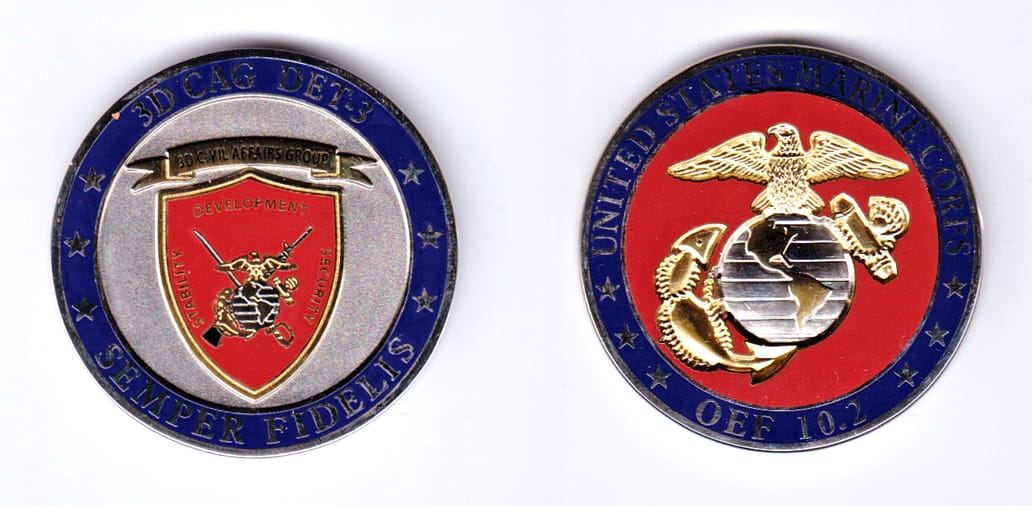 Round shaped, silver colored coin, 1-3/4 inches in diameter.