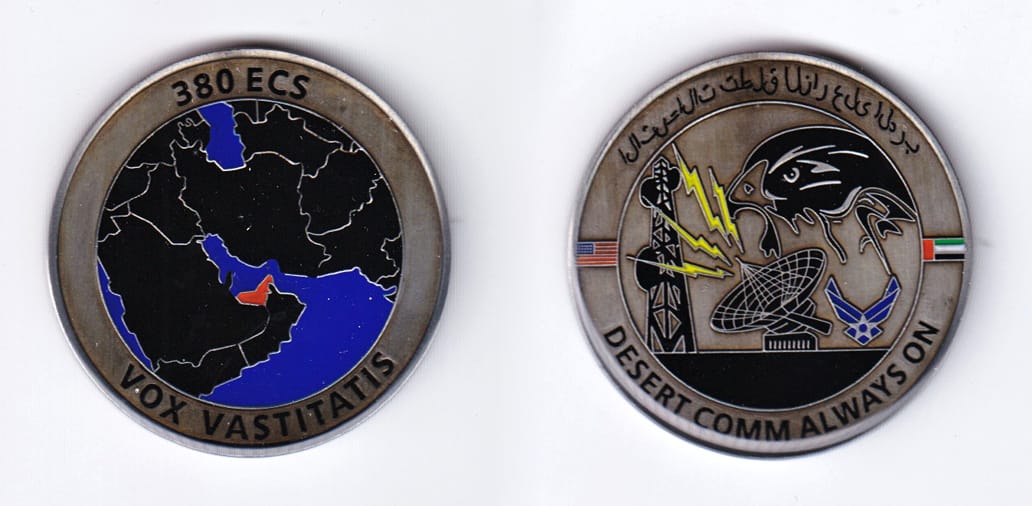 Round shaped, pewter colored coin, 1-5/8 inches in diameter.