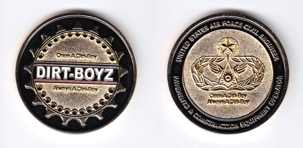 Round shaped, gold colored coin, 1-5/8 inches in diameter.