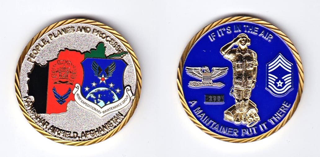 Round shaped, gold colored coin, 1-5/8 inches in diameter.