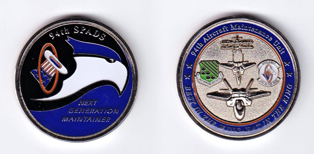 Round shaped, silver colored coin, 1-1/2 inches in diameter.