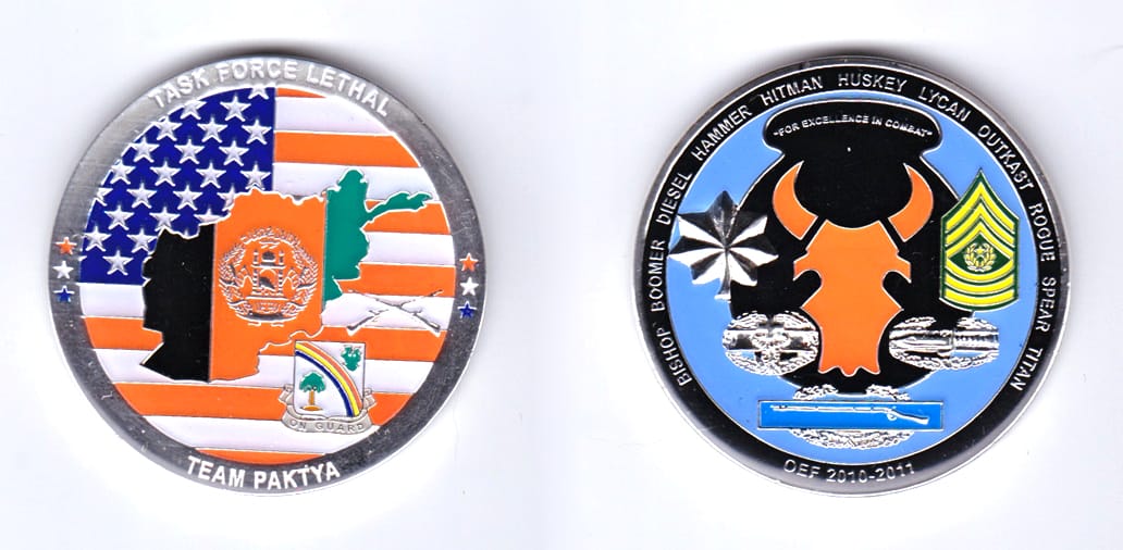 Round shaped, silver colored coin, 2 inches in diameter.