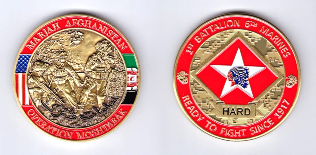 Round shaped, brass colored coin, 2 inches in diameter.