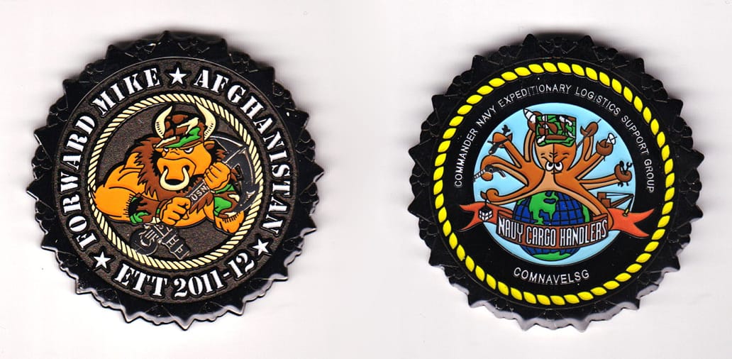 Round shaped, black colored coin, 2 inches in diameter.