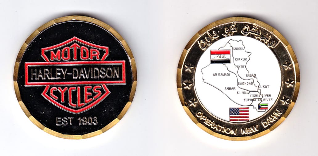 Round shaped, gold colored coin, 2 inches in diameter.