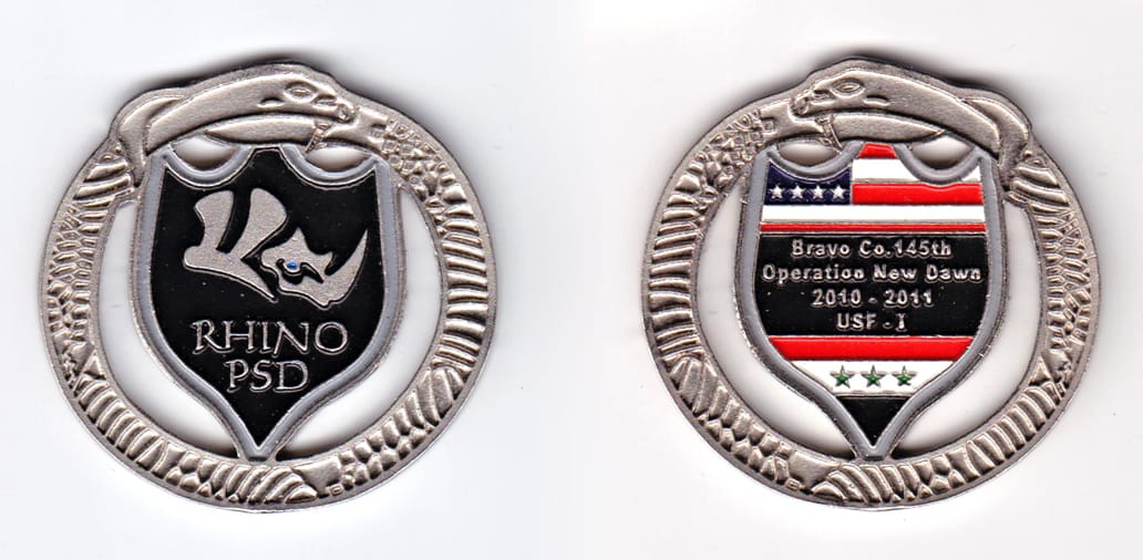 Round shaped, aluminum colored coin, 2-1/8 inches in diameter.