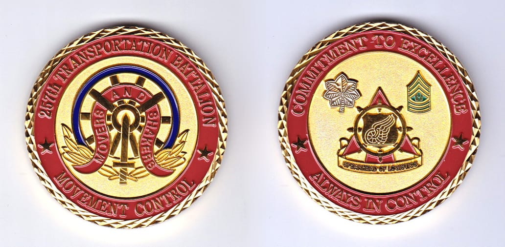 Round shaped, gold colored coin, 2 inches in diameter.