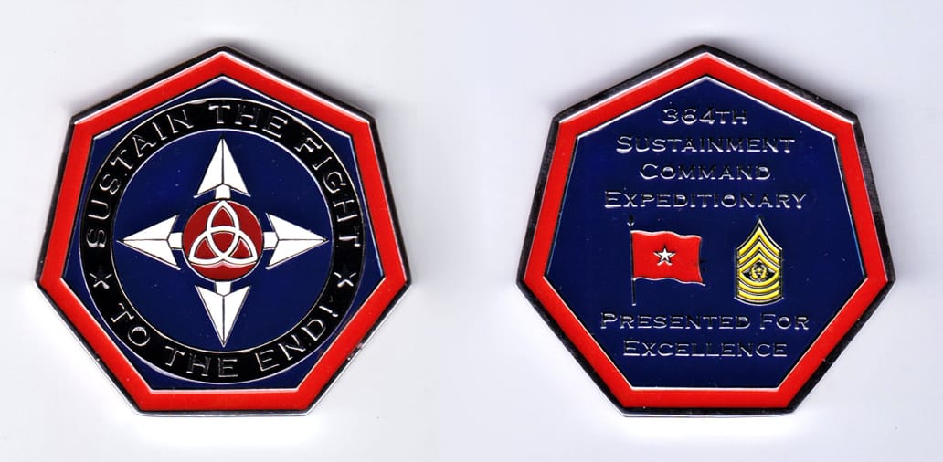 Heptagon shaped, silver colored coin, 2 inches wide x 2 inches high.