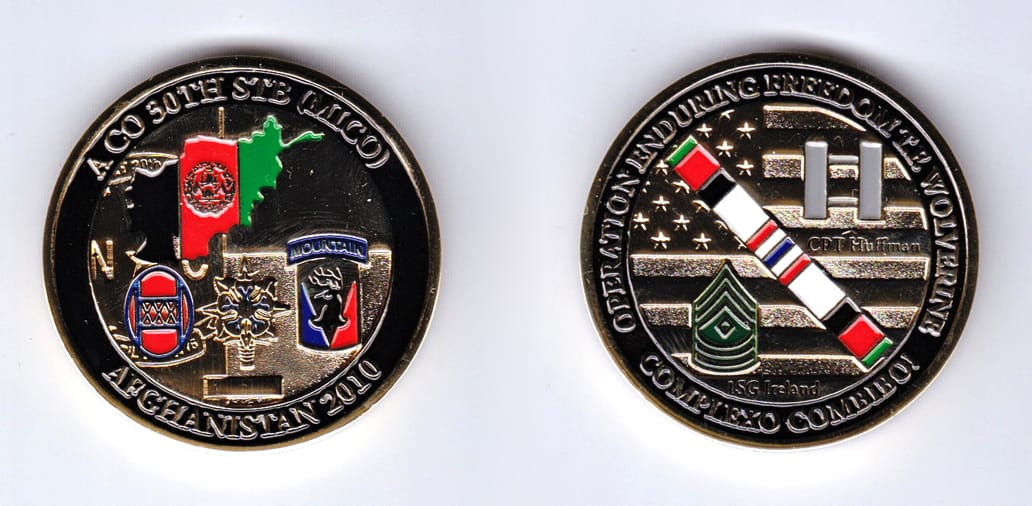 Round shaped, gold colored coin, 1-3/4 inches in diameter.