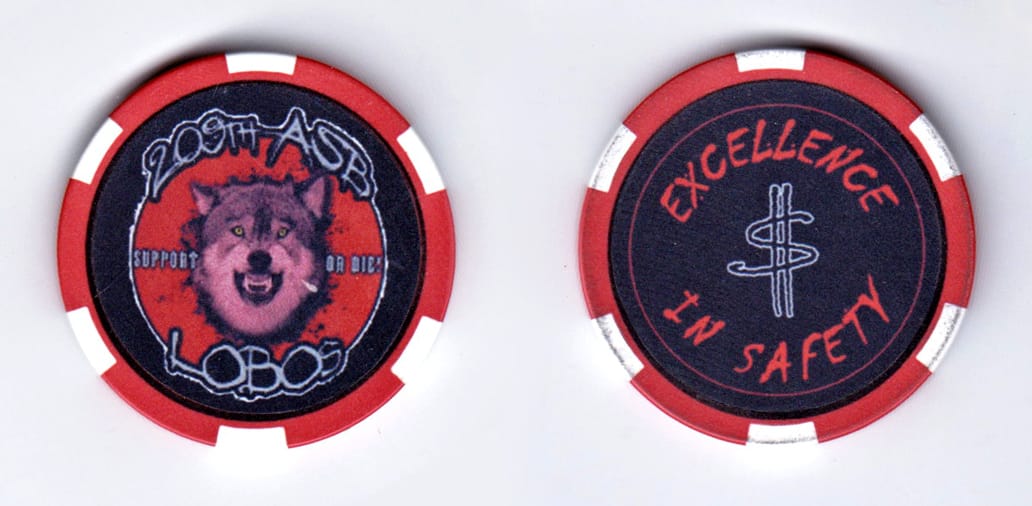 Round shaped, red colored poker chip, 1-1/2 inches in diameter.