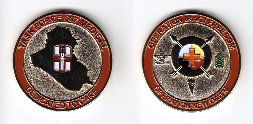 Round shaped, gold colored coin, 1-3/4 inches in diameter.