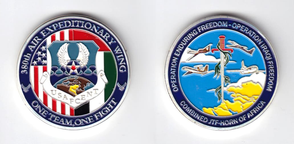 Round shaped, silver colored coin, 1-9/16 inches in diameter.