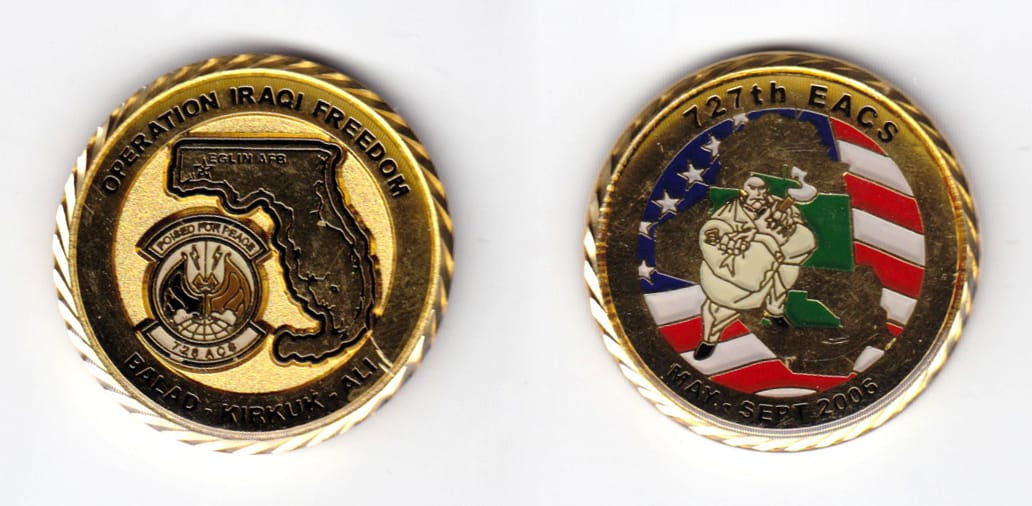 Round shaped, gold colored coin, 1-9/16 inches in diameter.